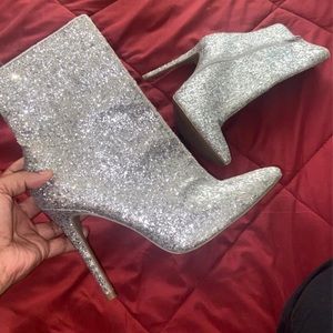 Shiny heeled boots